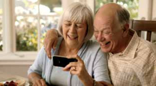 older couple looking at smartphone